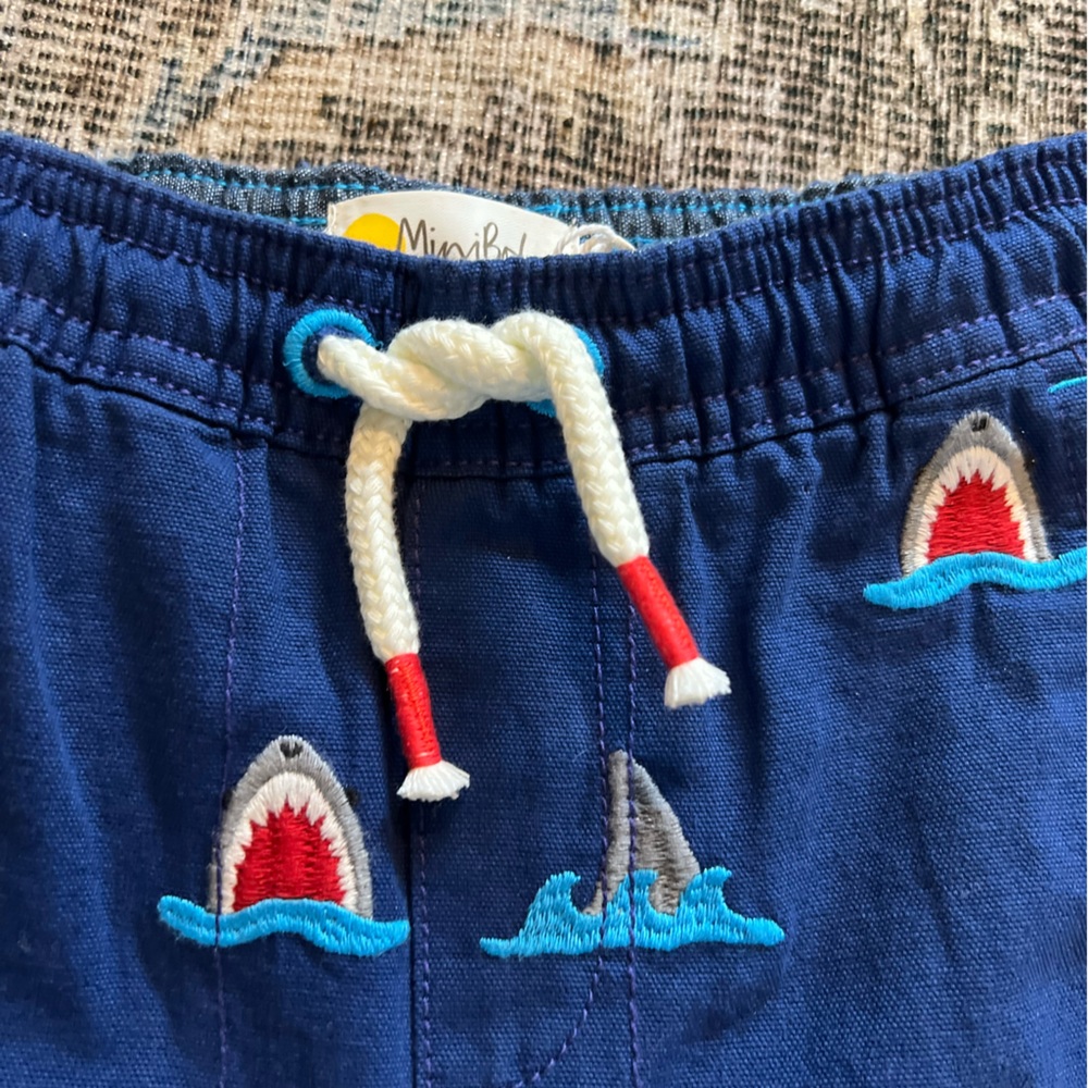 Mini Boden Blue and Red Shark Print Swim Shorts - Picture 2 of 3